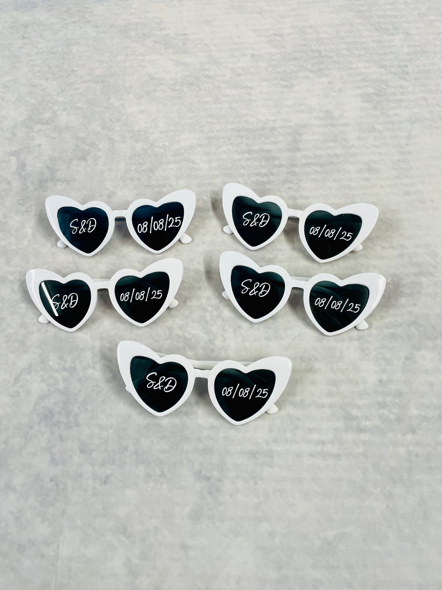 Personalised White heart sunglasses, perfect photo prop for the wedding day, customised with couples initials and wedding date.