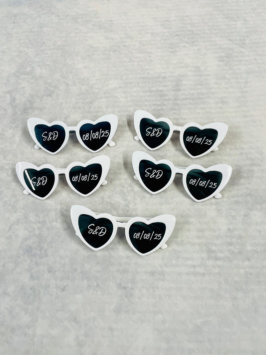 Personalised White heart sunglasses, perfect photo prop for the wedding day, customised with couples initials and wedding date.